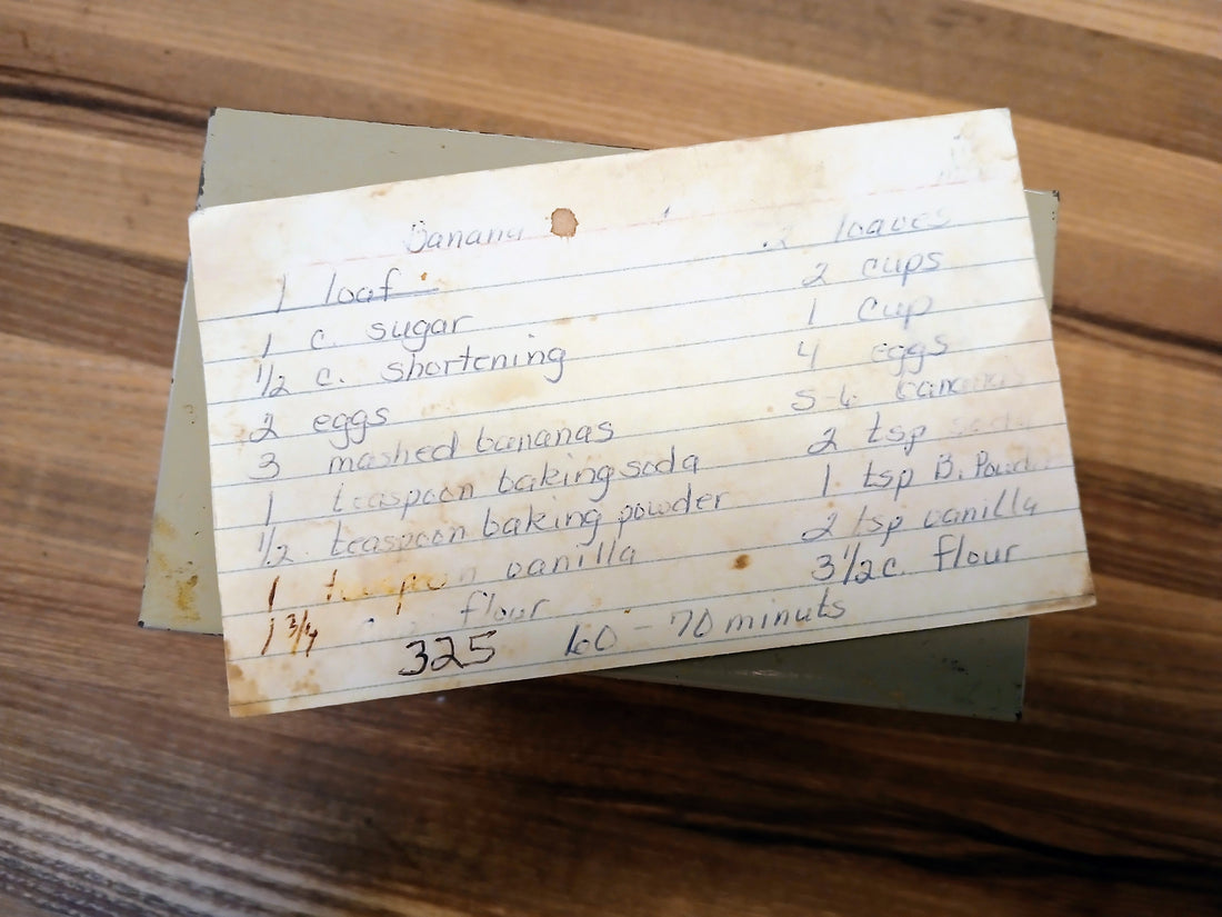 Old recipe card on top of index card box 
